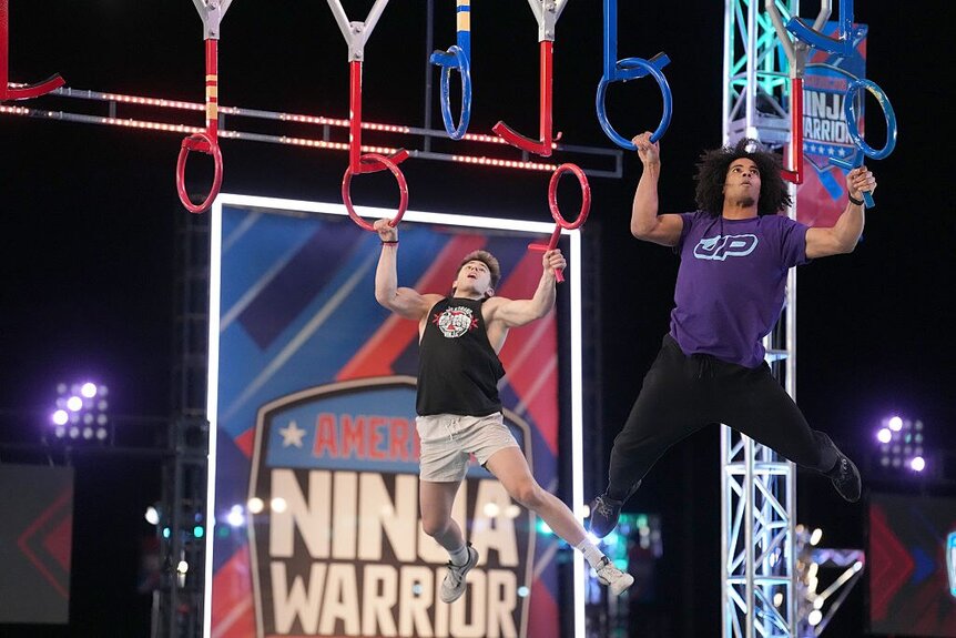 Kai Beckstran and Josiah Pippel competing during American Ninja Warrior Season 18.